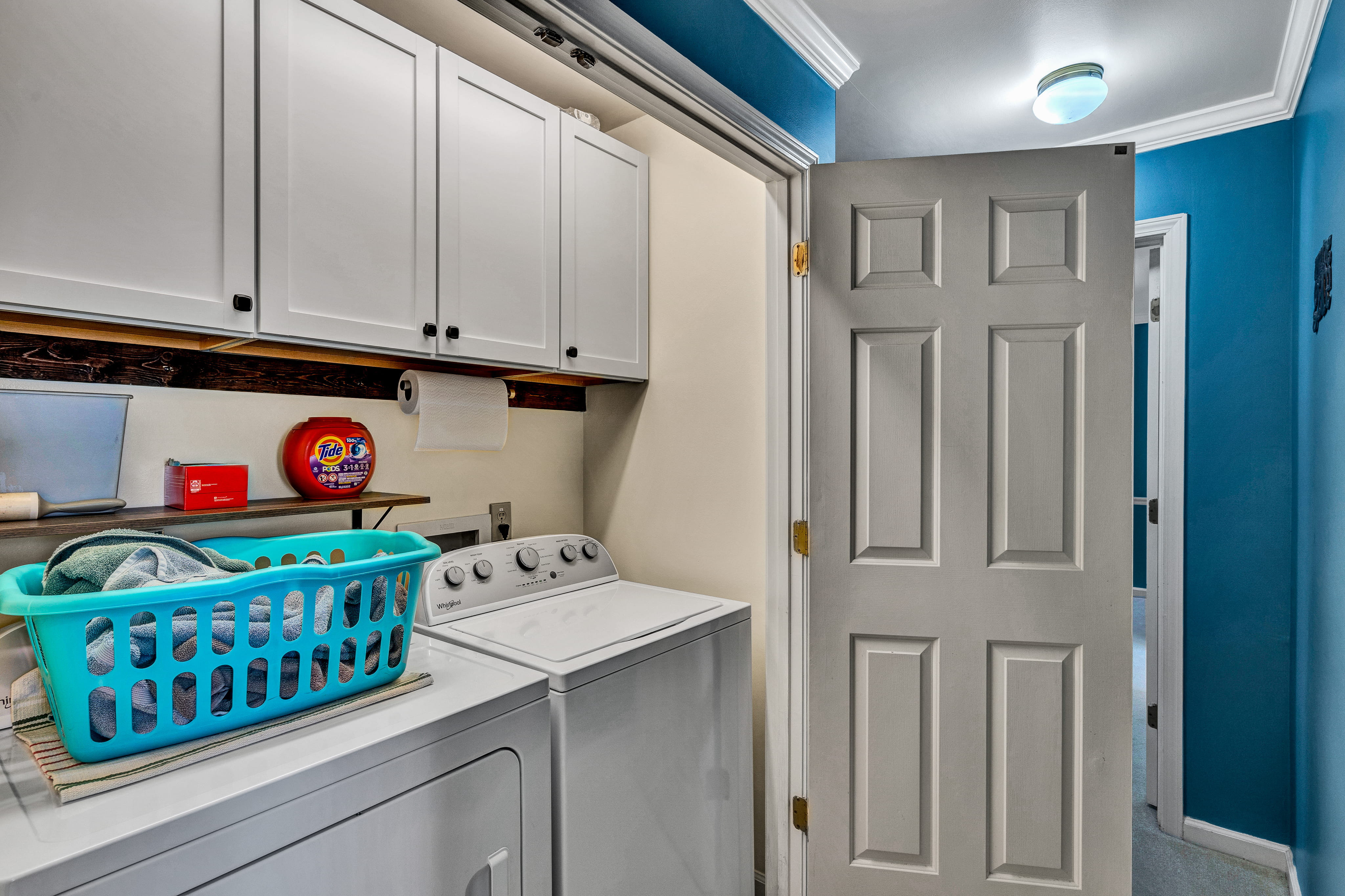 A laundry room reimagined by ReImagineering Spaces.